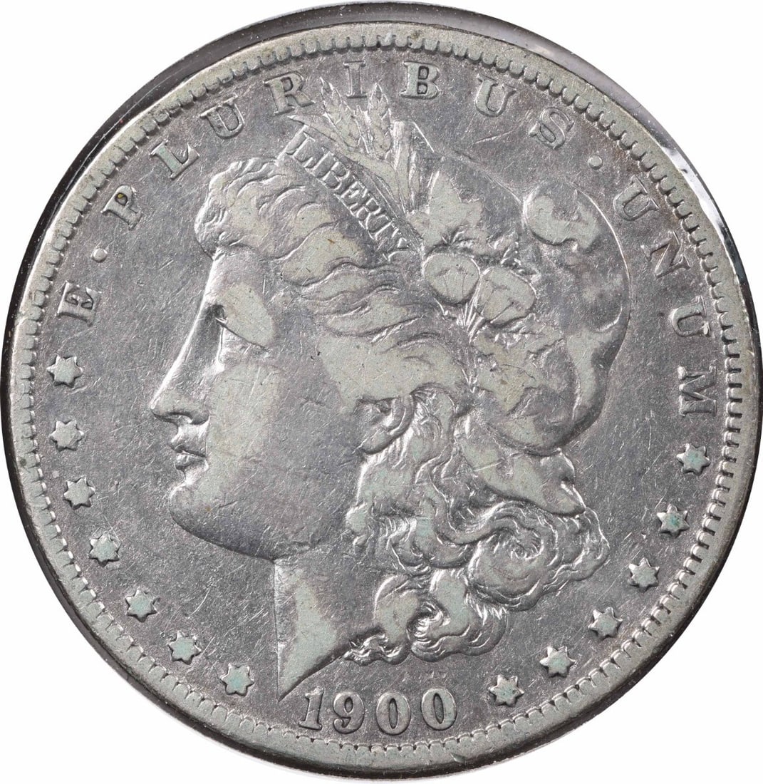 Morgan Silver Dollar 1900 CC F Uncertified: Morgan Silver Dollar 1900 CC F Uncertified The 1900 CC Morgan Silver Dollar is a circulated coin featuring a reeded edge and a distinctive mint mark. Made from 90% silver and 10% copper, this coin is 