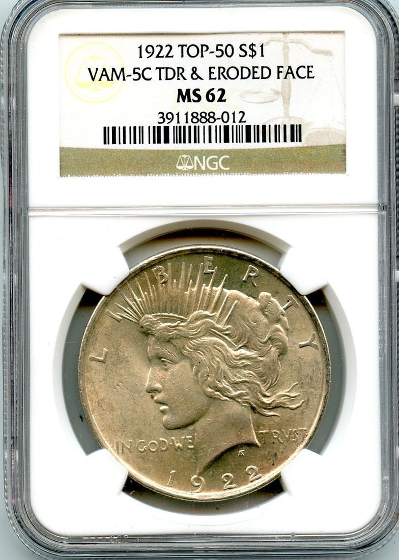 C5952- 1922 VAM-5C TDR & ERODED FACE TOP 50 PEACE DOLLAR NGC MS62: C5952- 1922 VAM-5C TDR & ERODED FACE TOP 50 PEACE DOLLAR NGC MS62 The 1922 VAM-5C TDR & ERODED FACE TOP 50 PEACE DOLLAR is a highly detailed and unique coin, graded MS62 by the Numismatic Guaranty Cor