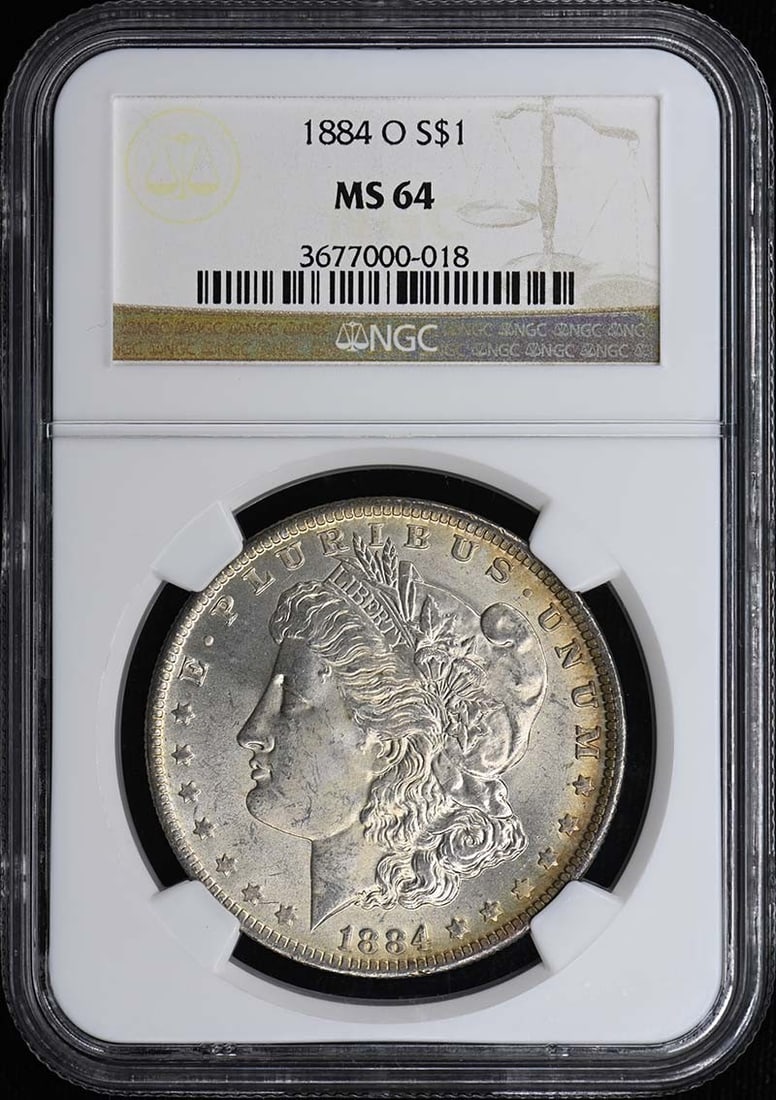 S$1 MS64 NGC Morgan Dollar 1884: S$1 MS64 NGC Morgan Dollar 1884 MS64 NGC Morgan Dollar 1884, certified by the Numismatic Guaranty Corporation (NGC) with a grade of MS64, is a highly detailed and well-preserved example of the 1884 Mo