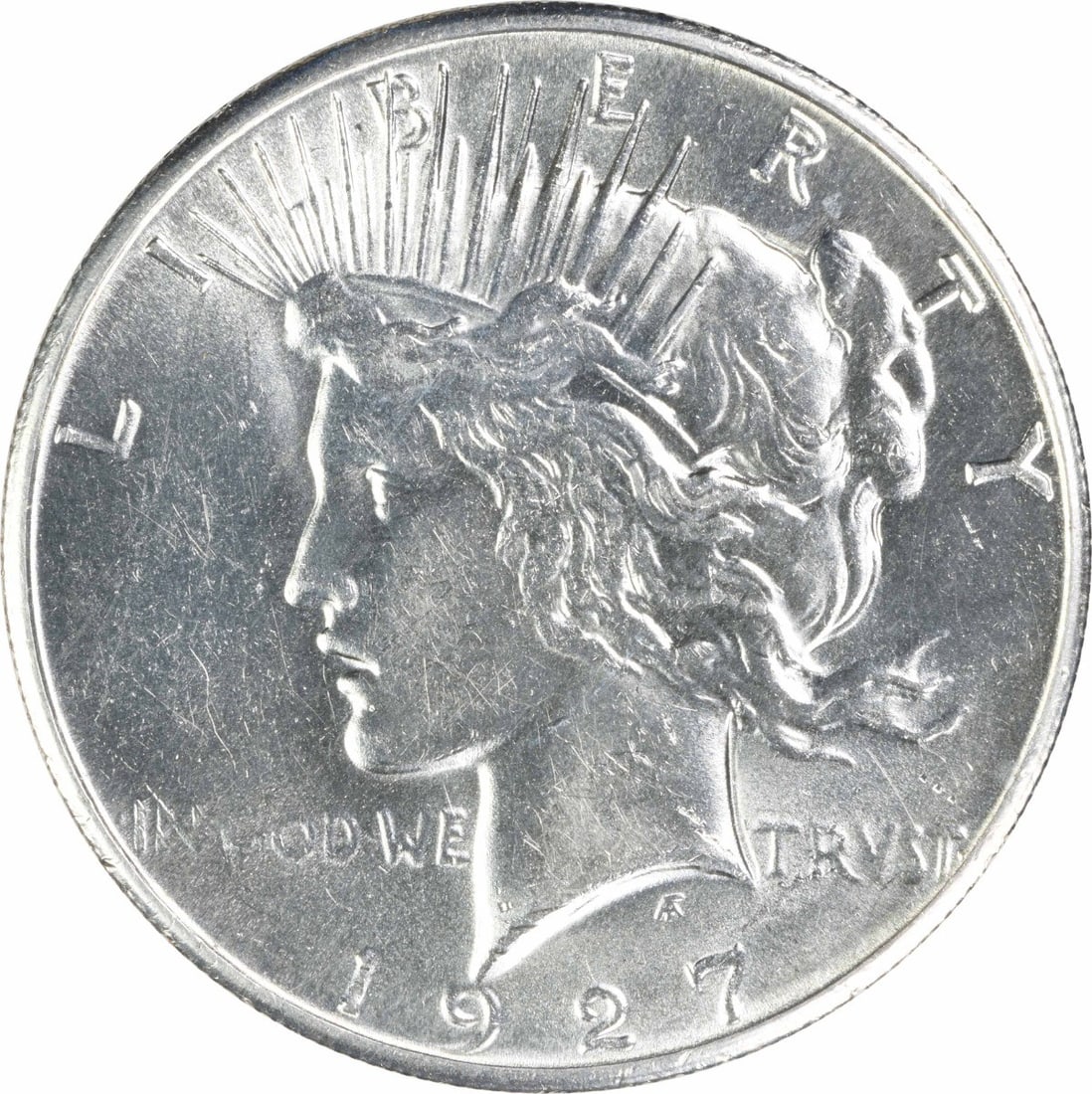 Silver Peace Dollar Choice BU 1927 Uncertified: Silver Peace Dollar Choice BU 1927 Uncertified The 1927 Silver Peace Dollar is a highly detailed and intricately designed coin, featuring a striking image of Lady Liberty on the obverse and a depictio
