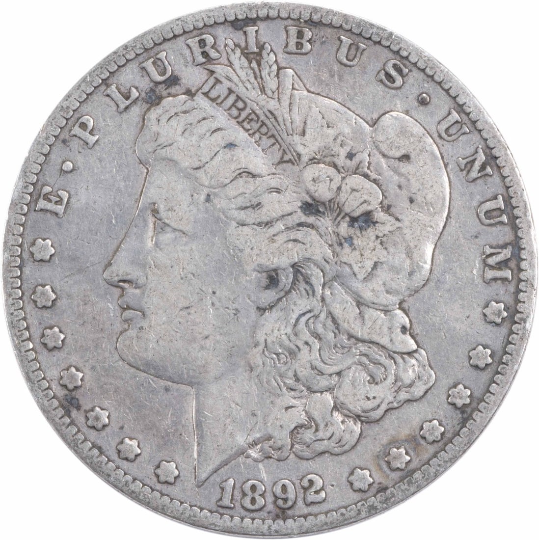 1892-S Morgan Silver Dollar VF Uncertified: 1892-S Morgan Silver Dollar VF Uncertified The 1892-S Morgan Silver Dollar is a stunning example of American numismatics, featuring a reeded edge and a distinctive mint mark. Certified as Uncertified 
