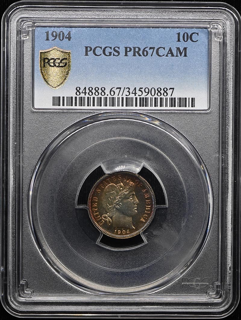 PCGS PR67CAM 1904 10C Barber Dime: PCGS PR67CAM 1904 10C Barber Dime The PCGS PR67CAM 1904 10C Barber Dime is a highly graded, uncirculated proof coin with a stunning grade of PR67. Certified by the prestigious Professional Coin Gradin