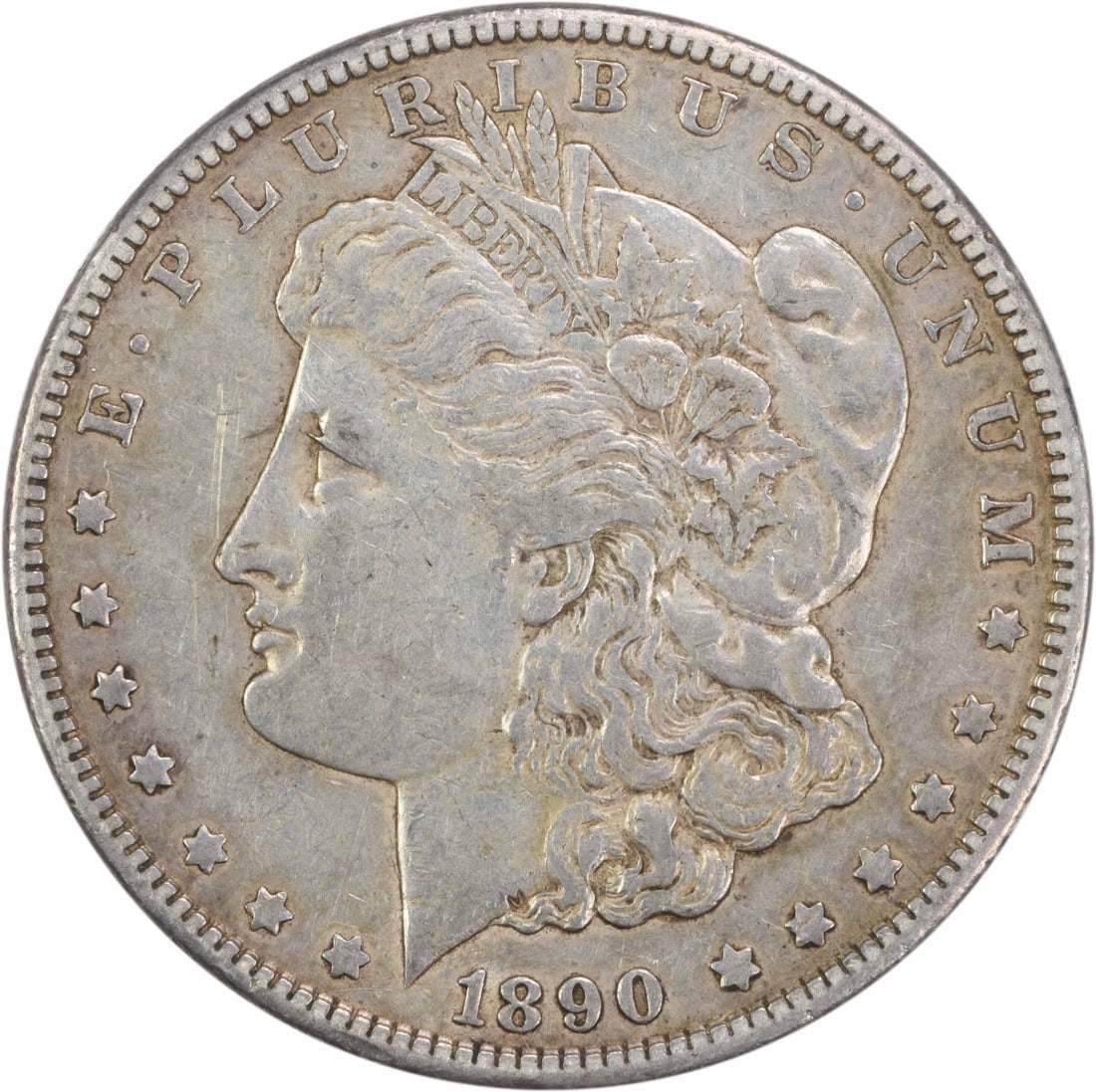 Uncertified EF Morgan Silver Dollar 1890 CC: Uncertified EF Morgan Silver Dollar 1890 CC The 1890 CC Morgan Silver Dollar is a circulated coin with a rich history, featuring a George T. Morgan design and a reeded edge. Made from 90% silver and 1