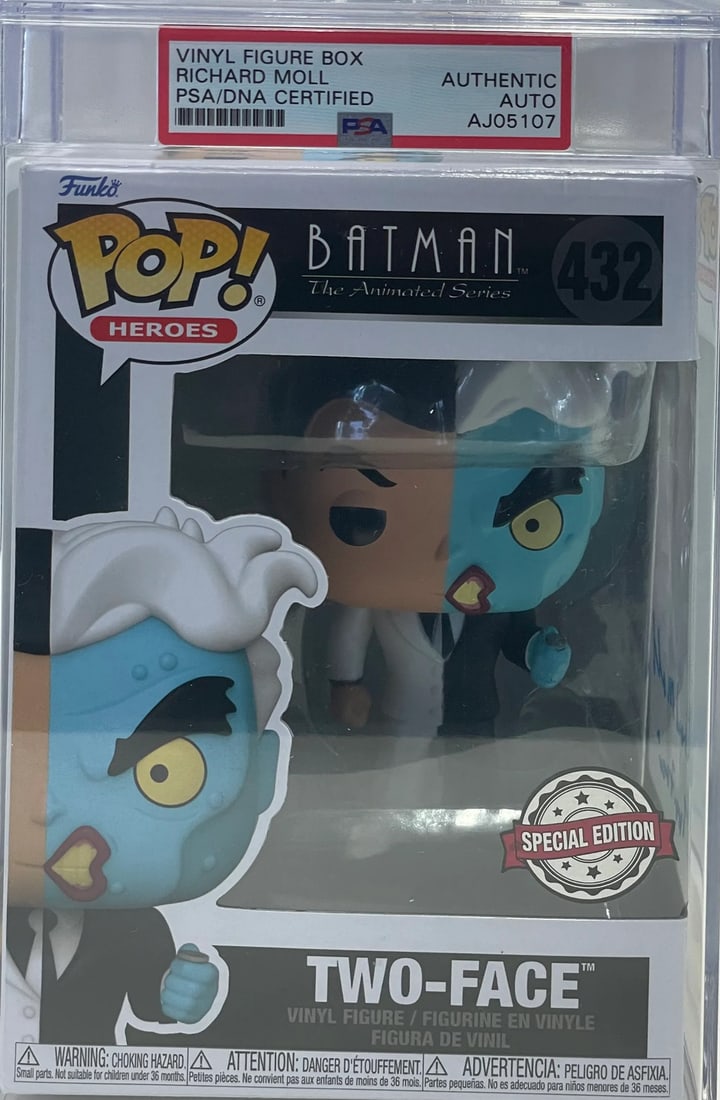 Richard Moll "Two Face" Autographed Two-Face Funko Pop (PSA): Richard Moll "Two Face" Autographed Two-Face Funko Pop (PSA) Signed in blue paint pensharpie across the front of this Richard Moll "Two Face" Funko Pop, the item bears a notable signature from the act