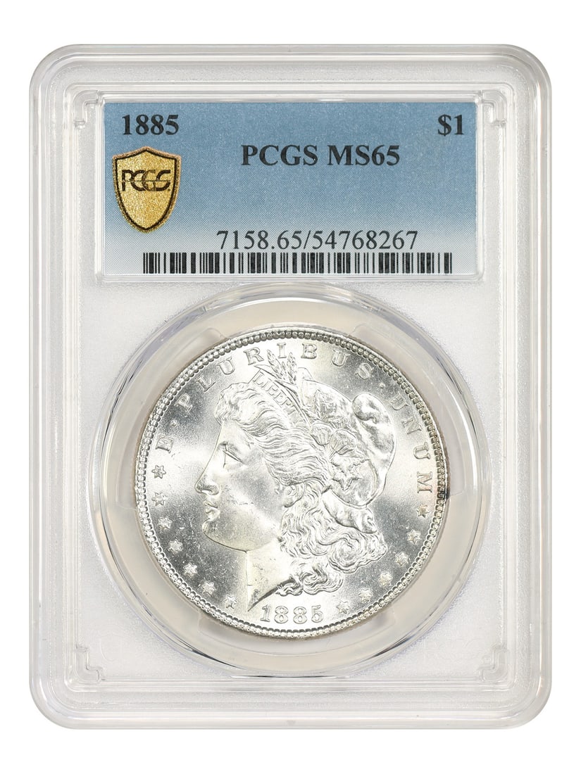 MS65 1885 PCGS Dollar Popular Collector Date: MS65 1885 PCGS Dollar Popular Collector Date MS65 1885 PCGS Dollar Popular Collector Date - A highly graded 1885 $1 coin, certified by PCGS as MS65, showcasing excellent condition and preservation. Th