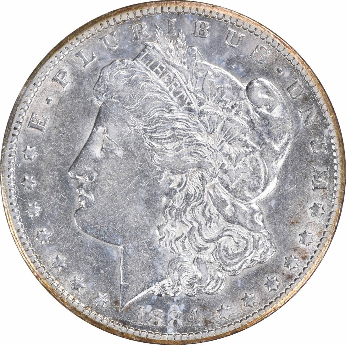 1884-CC Morgan Silver Dollar AU Slider Uncertified: 1884-CC Morgan Silver Dollar AU Slider Uncertified The 1884-CC Morgan Silver Dollar is an Uncertified Circulated coin, featuring a classic design with George T. Morgan's iconic portrait. Made from 90%