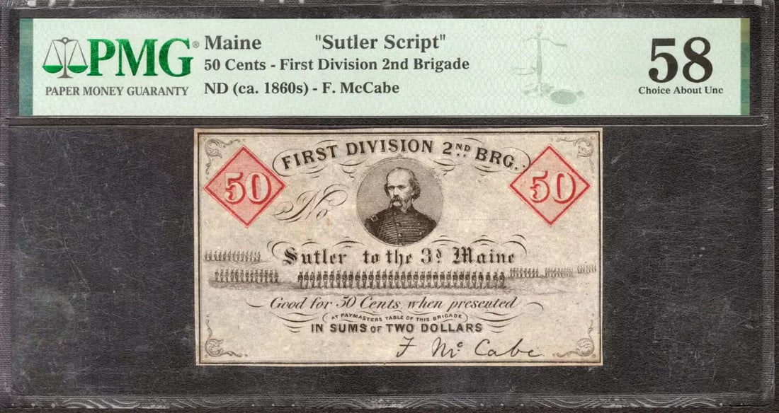 1860 50c FIRST DIVISION 2ND BRIGADE MAINE SUTLER SCRIPT NOTE F. McCABE PMG AU 58: 1860 50c FIRST DIVISION 2ND BRIGADE MAINE SUTLER SCRIPT NOTE F. McCABE PMG AU 58 The 1860 50c First Division 2nd Brigade Maine Sutler Script Note features a unique blend of historical significance