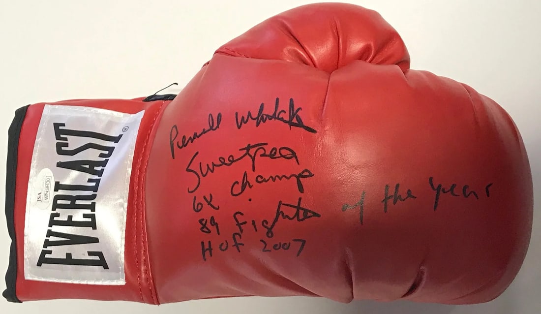 Pernell Whitaker Autographed Red Everlast Right Boxing Glove (JSA): Pernell Whitaker Autographed Red Everlast Right Boxing Glove (JSA) Signed by boxing legend Pernell Whitaker in black sharpie, this Everlast right boxing glove bears a unique inscription that reads "Sw