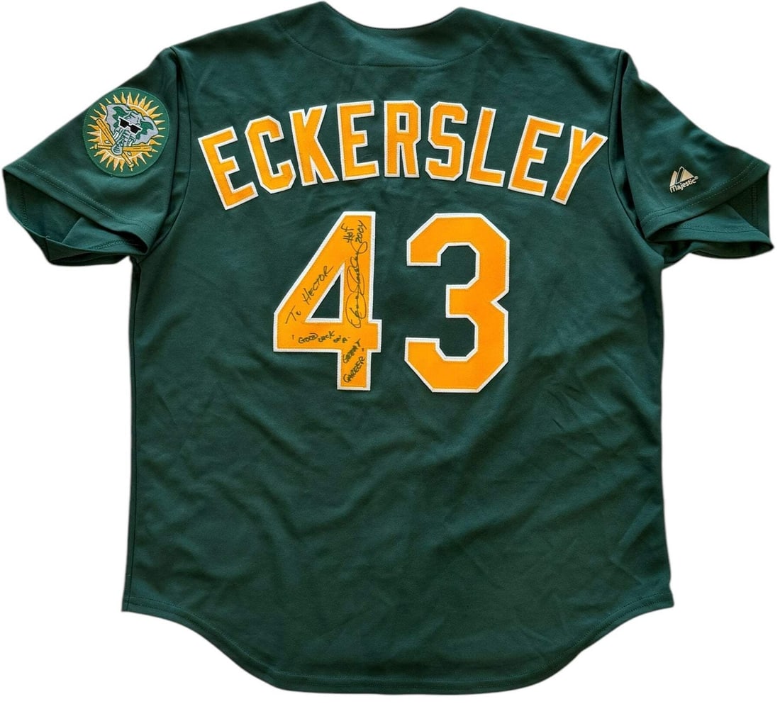 Authentic Oakland Majestic Dennis Eckersley Autographed Jersey: Authentic Oakland Majestic Dennis Eckersley Autographed Jersey Authentic Oakland Majestic Dennis Eckersley Autographed Jersey bears a signature in black sharpie across the jersey number with the
