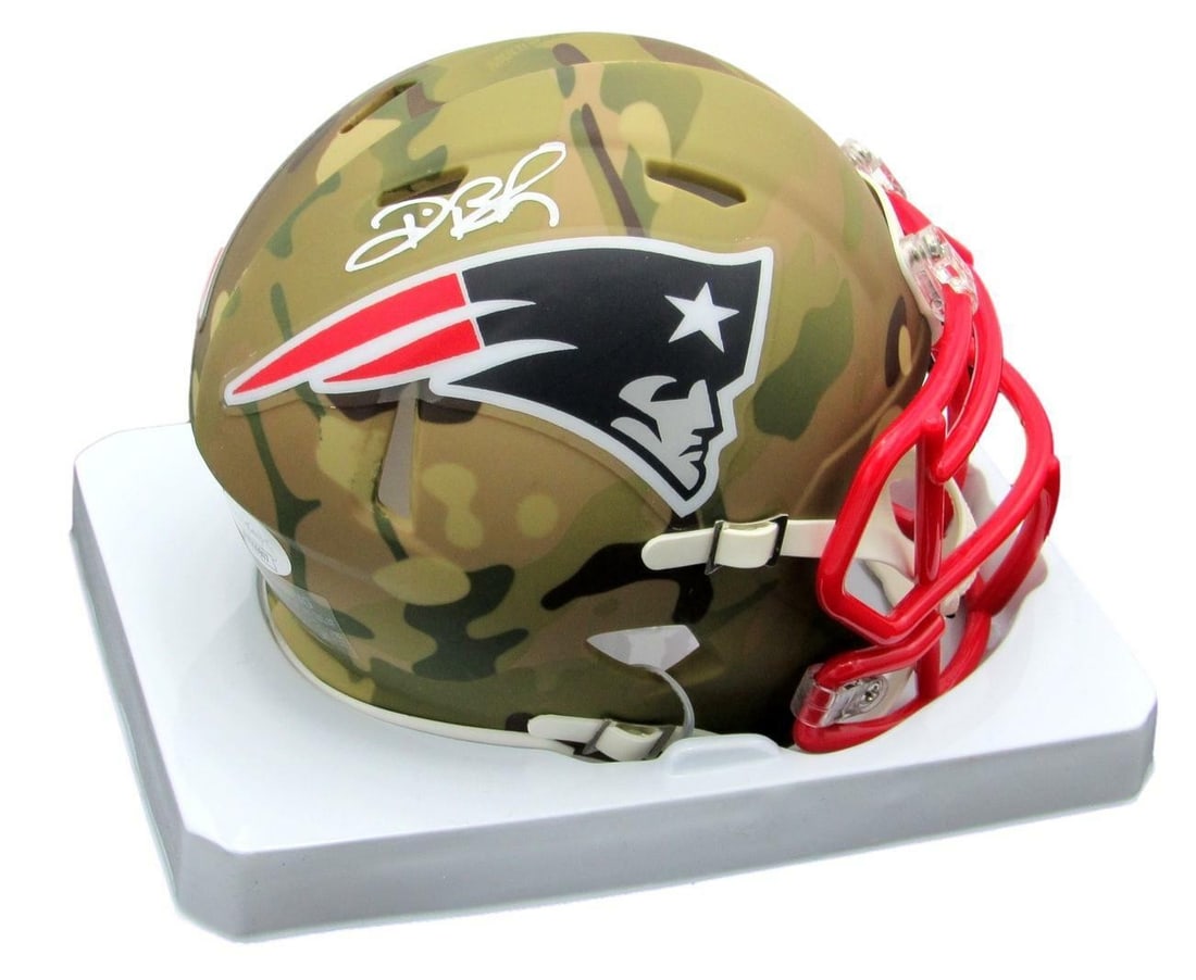 Deion Branch Signed/ Autographed Patriots Camo Mini Helmet JSA 159310: Deion Branch Signed/ Autographed Patriots Camo Mini Helmet JSA 159310 Signed by Deion Branch, this New England Patriots camo mini helmet is a unique collectible for football fans. The helmet features 