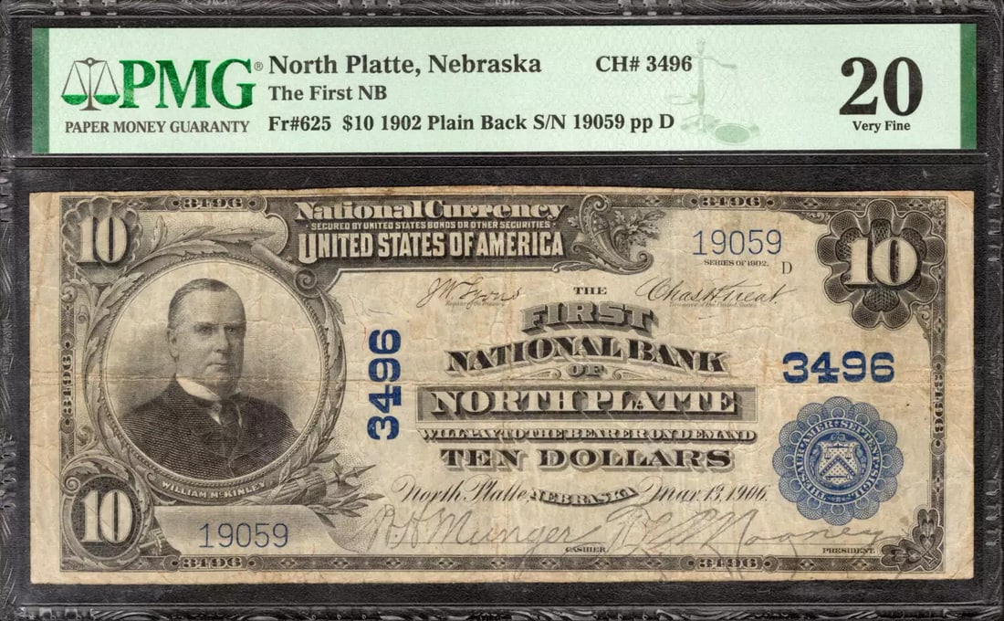 NATIONAL BANKNOTE CURRENCY PMG 20 VF NEBRASKA NORTH PLATTE 1902 $10: NATIONAL BANKNOTE CURRENCY PMG 20 VF NEBRASKA NORTH PLATTE 1902 $10 The 1902 $10 bill from the Third Charter Period features a unique serial number, 19059, and is certified by PMG as a VF 20. This