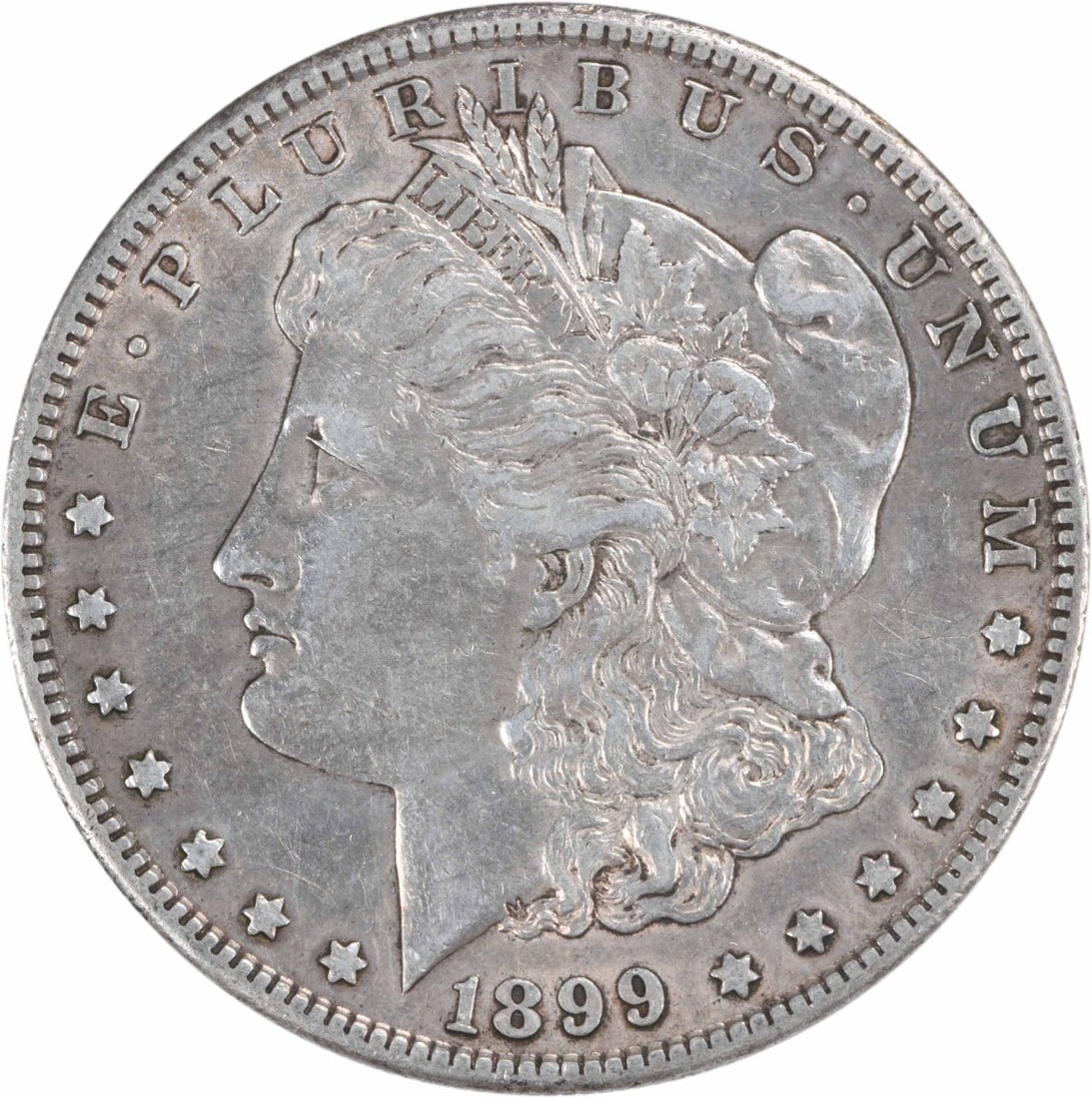 Morgan Silver Dollar 1899-S AU Uncertified: Morgan Silver Dollar 1899-S AU Uncertified The 1899-S Morgan Silver Dollar is a circulated coin with an AU grade, bearing the reeded edge and a distinctive S mint mark. Made of 90% silver and 10% copp