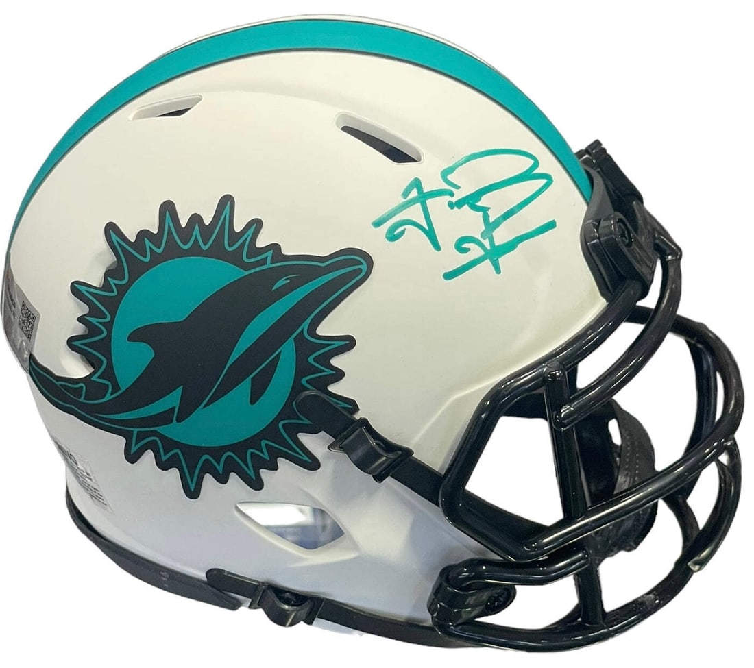 Tua Tagovailoa Autographed Miami Dolphins Lunar Mini Helmet: Tua Tagovailoa Autographed Miami Dolphins Lunar Mini Helmet Signed in teal paint pen across the side of the helmet, this Tua Tagovailoa Autographed Miami Dolphins Lunar Mini Helmet is a unique collect