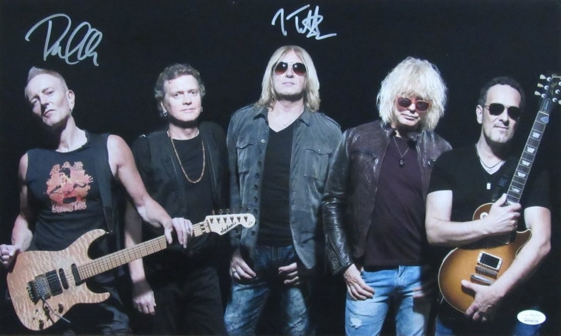 Joe Elliott/ Phil Collen Dual-Signed/ Auto 12x20 Photo Def Leppard JSA 190169: Joe Elliott/ Phil Collen Dual-Signed/ Auto 12x20 Photo Def Leppard JSA 190169 Item Specifics: Industry: Music Object Type: Photograph Original/Reproduction: Original Signed: Yes Product Disclaimer: Al