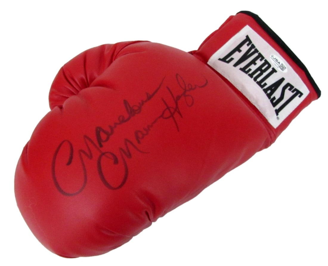 Marvelous Marvin Hagler Signed/ Auto Left Red Everlast Boxing Glove JSA 213344: Marvelous Marvin Hagler Signed/ Auto Left Red Everlast Boxing Glove JSA 213344 Signed by Marvelous Marvin Hagler, this iconic Everlast boxing glove is a must-have for collectors and boxing enthusiasts