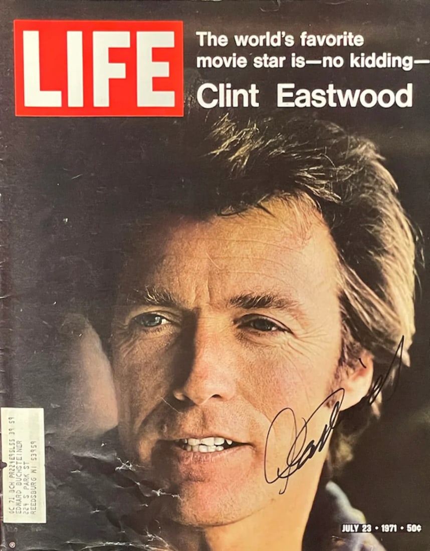 Clint Eastwood Autographed Life Magazine (JSA): Clint Eastwood Autographed Life Magazine (JSA) Clint Eastwood's name is signed in black sharpie across the front of the cover of this Life Magazine. The item is accompanied by a Certificate of Authent