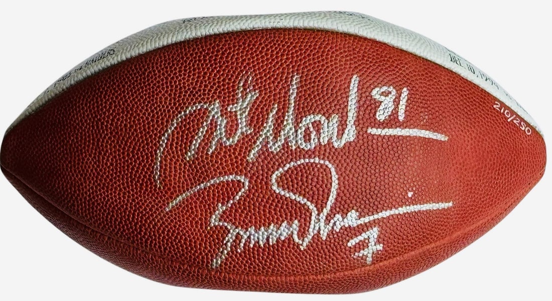 Art Monk Boomer Esiason Autographed Official Wilson Football #210/ 250 (JSA): Art Monk Boomer Esiason Autographed Official Wilson Football #210/ 250 (JSA) Autographed Official Wilson Football #210/250 by Art Monk and Boomer Esiason in silver paint pen, bearing the distinctive s
