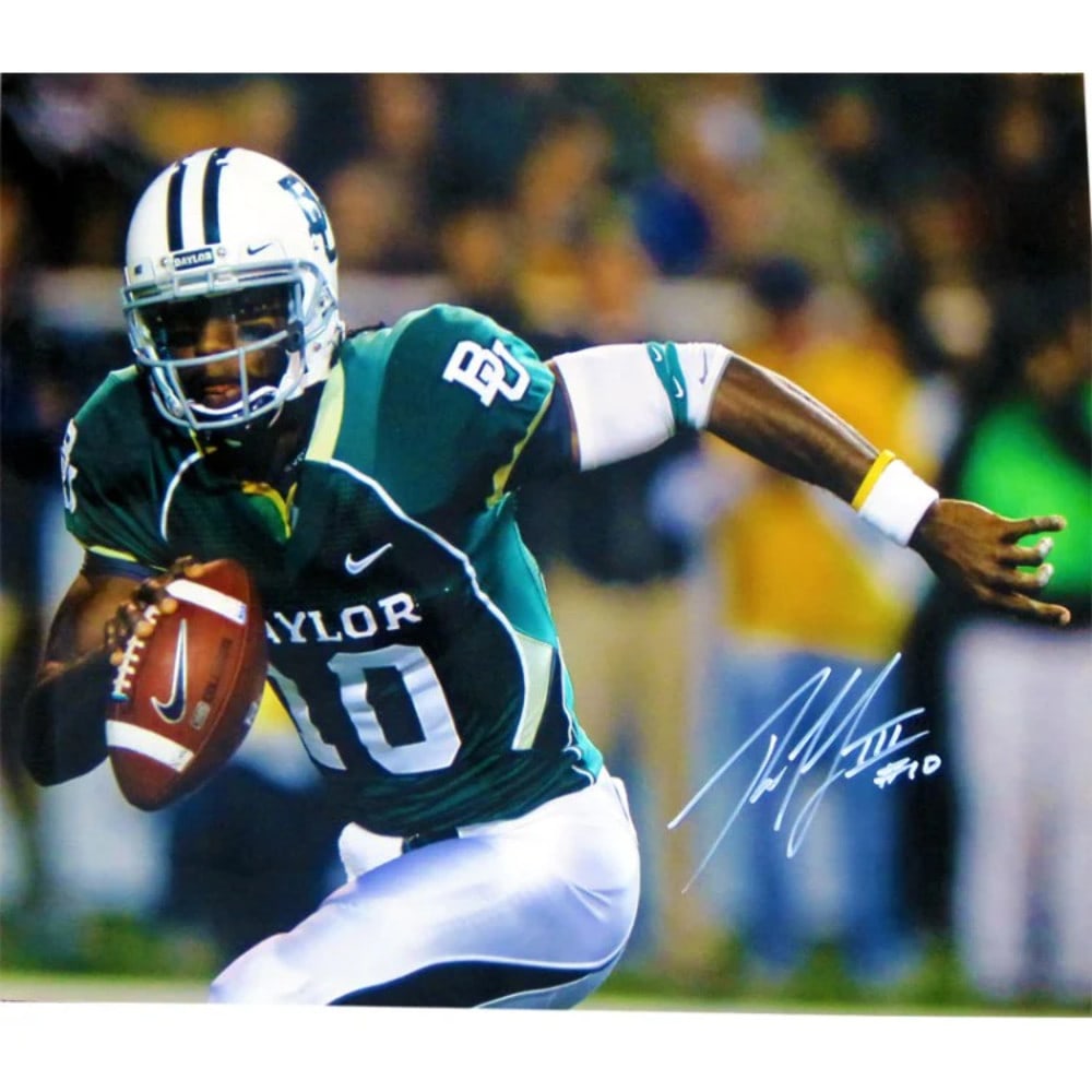 Robert Griffin III Autographed Photo: Robert Griffin III Autographed Photo Signed in silver sharpie, this 16x20 photo of Robert Griffin III bears his signature. The item is a unique piece of memorabilia, perfect for fans of the NFL quarte