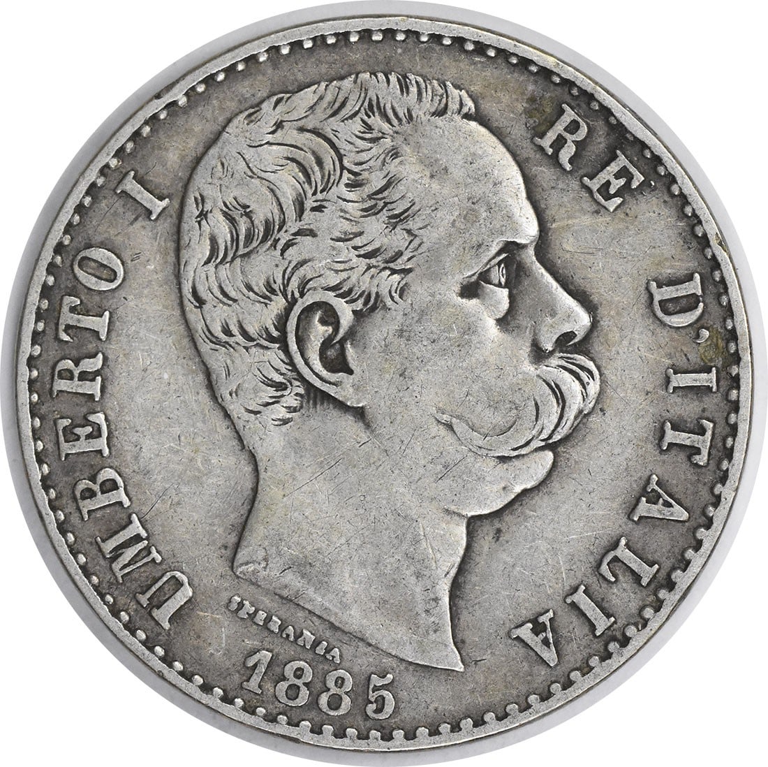 1885 R Italy 2 Lire KM23 VF Uncertified: 1885 R Italy 2 Lire KM23 VF Uncertified 1885 R Italy 2 Lire KM23 VF Uncertified - A circulated 2 Lire coin from Italy, dated 1885 and bearing the KM23 designation, with a high-grade VF condition that 
