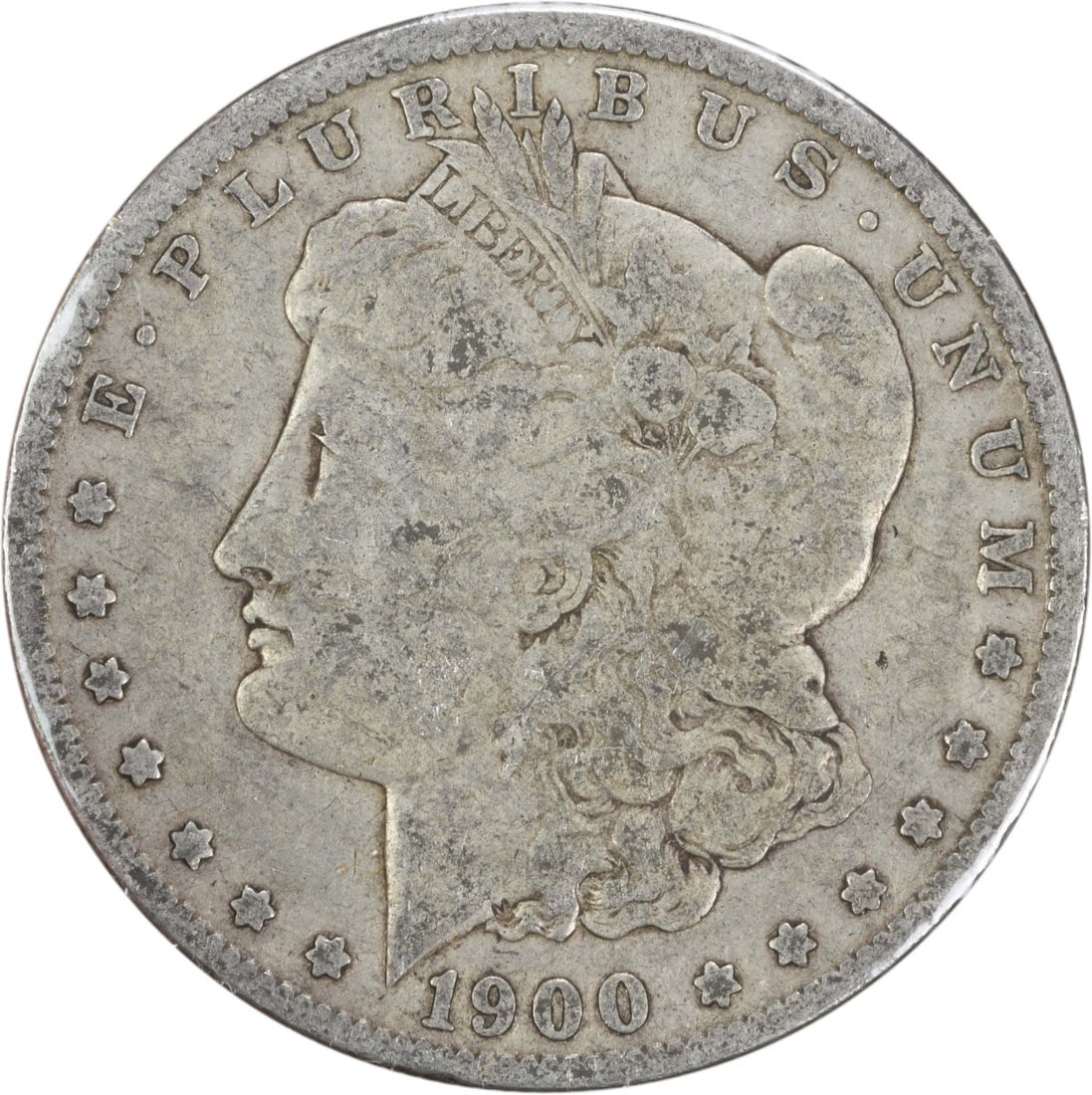 Morgan Silver Dollar 1900-O CC VG Uncertified: Morgan Silver Dollar 1900-O CC VG Uncertified The 1900-O Morgan Silver Dollar is a circulated coin with a rich history, featuring a distinctive reeded edge and a silver composition. This particular co