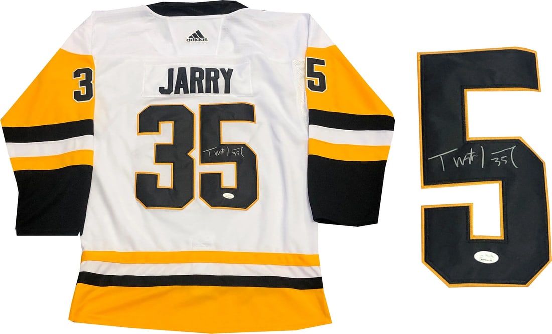 Jarry Tristan Autographed Penguins White Jersey (JSA): Jarry Tristan Autographed Penguins White Jersey (JSA) Tristan Jarry's silver sharpie signature across the jersey number on the back of this Pittsburgh Penguins white jersey adds a unique touch to this