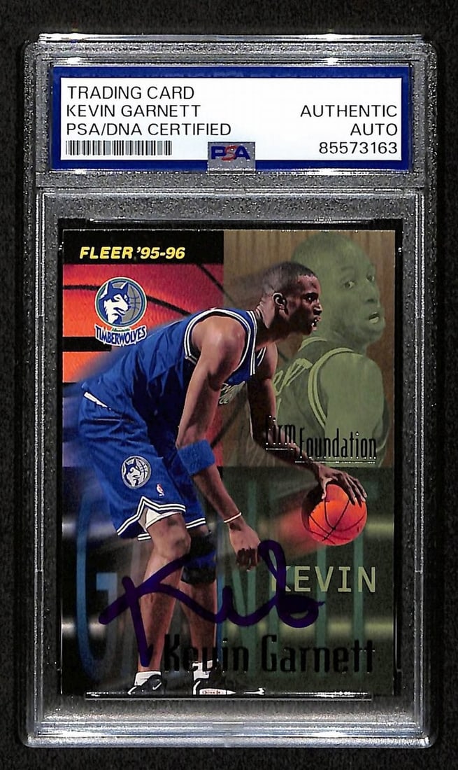 HOF Signed Kevin Garnett 1995-96 Fleer RC Card Auto PSA DNA Card #335: HOF Signed Kevin Garnett 1995-96 Fleer RC Card Auto PSA DNA Card #335 Signed by Kevin Garnett, this 1995-96 Fleer RC Card Auto PSA DNA Card #335 is a rare and unique piece of sports memorabilia. The