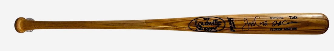 Autographed Louisville Slugger T141 Game Model Bat by Jeff Conine: Autographed Louisville Slugger T141 Game Model Bat by Jeff Conine Autographed Louisville Slugger T141 Game Model Bat by Jeff Conine bears a signature in black sharpie across the barrel. This unique pi