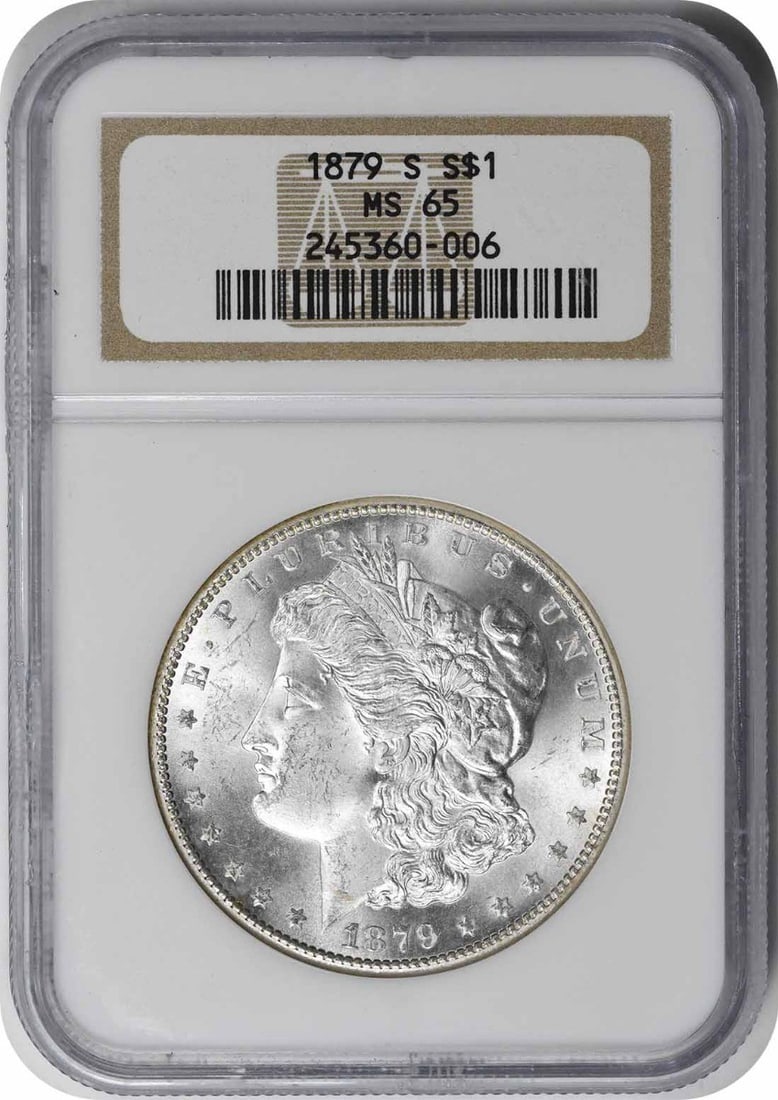 1879-S Morgan Silver Dollar MS65 NGC: 1879-S Morgan Silver Dollar MS65 NGC The 1879-S Morgan Silver Dollar is a highly detailed and intricately designed coin, featuring the iconic portrait of Lady Liberty on its obverse side. With its ree