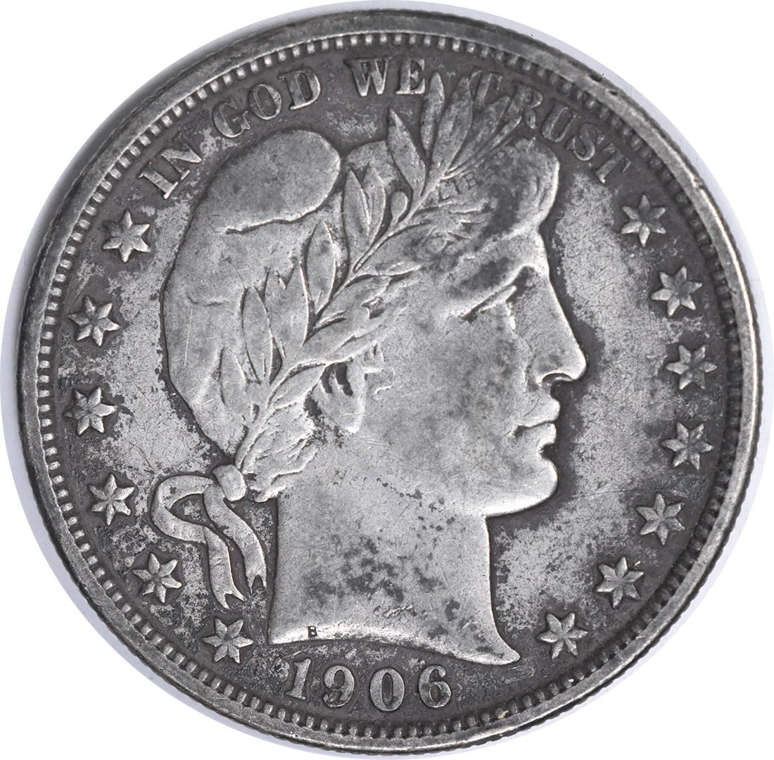 1906-D Barber Silver Half Dollar VF Uncertified: 1906-D Barber Silver Half Dollar VF Uncertified The 1906-D Barber Silver Half Dollar is a circulated coin with a distinctive design, featuring a portrait of President Charles G. Dawes on the obverse a