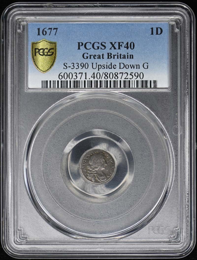 1677 Great Britain Silver 1 Penny S-3390 Upside Down G PCGS XF40: 1677 Great Britain Silver 1 Penny S-3390 Upside Down G PCGS XF40 Silver 1 Penny from 1677, a rare coin from Great Britain, graded PCGS XF40. This coin bears the S-3390 designation, indicating its uniq