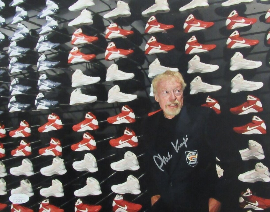 Nike JSA Autographed Photo 11x14 HOF Phil Knight: Nike JSA Autographed Photo 11x14 HOF Phil Knight Authentic 11x14 photo of Phil Knight, co-founder of Nike, signed by him. This rare piece of sports history is a unique opportunity for collectors to ow