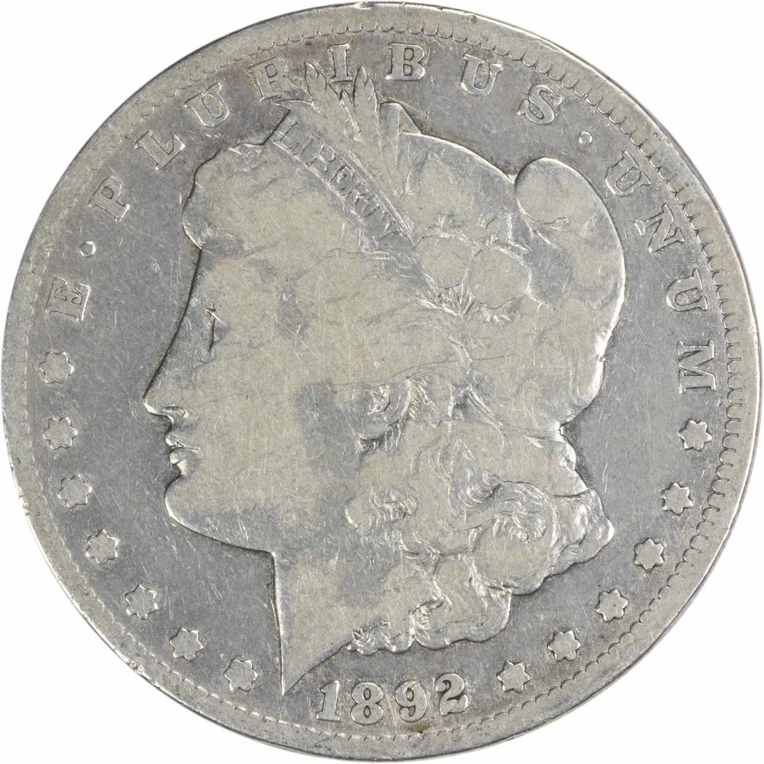 1892-CC Morgan Silver Dollar VG Uncertified: 1892-CC Morgan Silver Dollar VG Uncertified The 1892-CC Morgan Silver Dollar is a circulated coin with a VG grade, bearing the distinctive reeded edge and CC mint mark. Made from 90% silver and 10% co