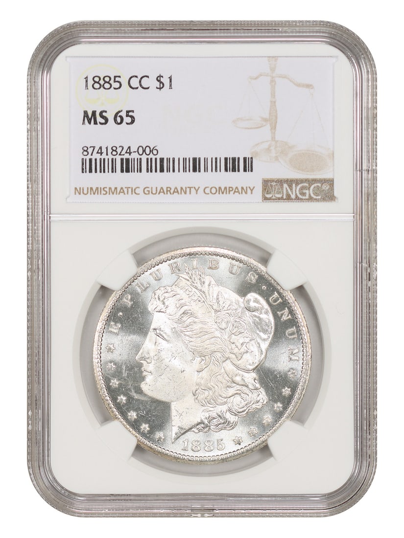 1885-CC $1 NGC MS65 - Morgan Dollar - Scarce Prooflike CC Issue: 1885-CC $1 NGC MS65 - Morgan Dollar - Scarce Prooflike CC Issue The 1885-CC $1 Morgan Dollar is a highly sought-after coin, particularly in its prooflike condition. With a grade of MS65 from the Numis