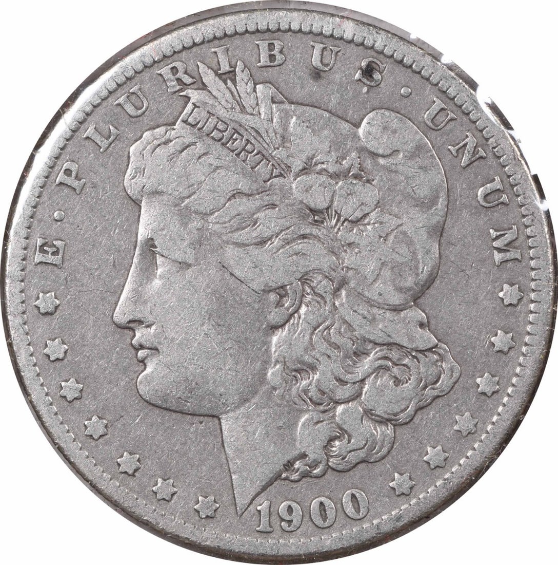 1900-O/ CC Morgan Silver Dollar F Uncertified: 1900-O/ CC Morgan Silver Dollar F Uncertified The 1900-O/CC Morgan Silver Dollar is a stunning example of early American numismatics, featuring a reeded edge and a distinctive mint mark. With its 90% 