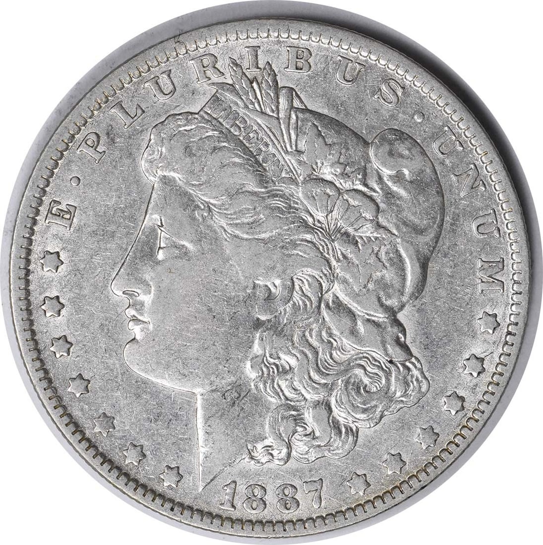 1887/ 6-O VAM 3 Morgan Silver Dollar 7/ 6 EF Uncertified: 1887/ 6-O VAM 3 Morgan Silver Dollar 7/ 6 EF Uncertified The 1887/6-O VAM 3 Morgan Silver Dollar is a circulated example with an EF grade, featuring a reeded edge and a distinctive mint mark. This 90%