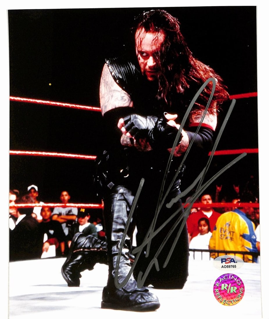 Pro Wrestler Signed PSA 194983 Undertaker 8x10 Photo Autographed: Pro Wrestler Signed PSA 194983 Undertaker 8x10 Photo Autographed The Undertaker's imposing presence is captured in this 8x10 photo, bearing his signature. A rare opportunity for wrestling fans to own 