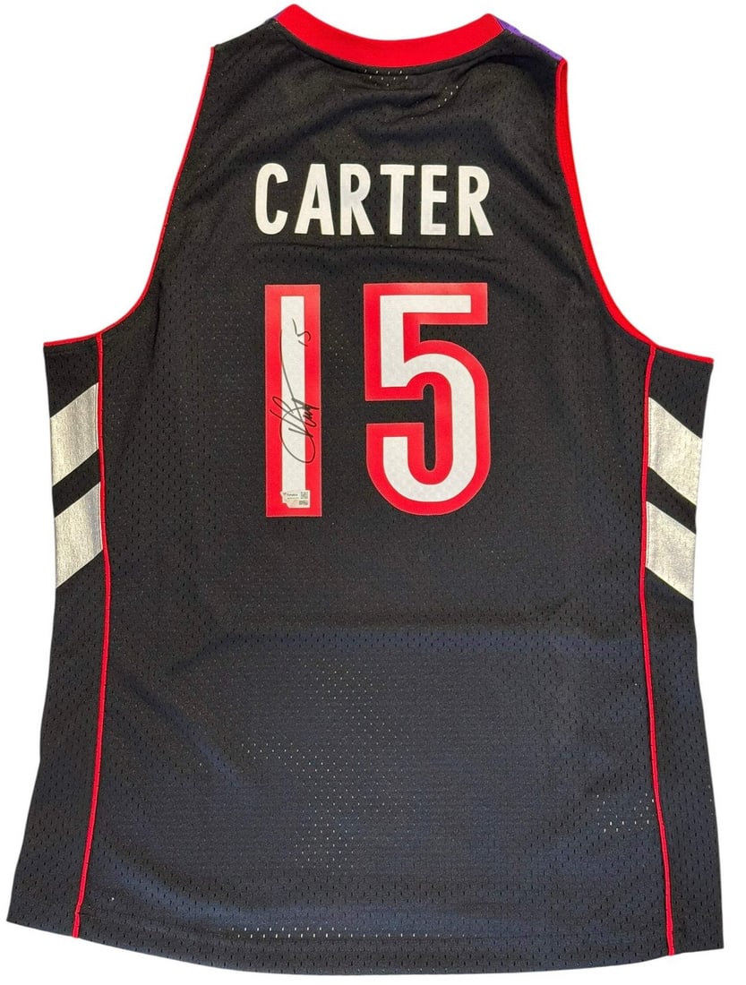 Vince Carter autographed Authentic Raptors Jersey by Mitchell & Ness Fanatics: Vince Carter autographed Authentic Raptors Jersey by Mitchell & Ness Fanatics Authentic Vince Carter autographed Mitchell & Ness Authentic Raptors Jersey, signed in black sharpie on the back of the je