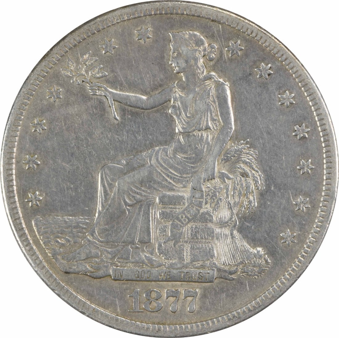 Trade Silver Dollar EF Uncertified 1877-S: Trade Silver Dollar EF Uncertified 1877-S EF Uncertified 1877-S Trade Dollar - A Rare Silver Dollar from the San Francisco Mint. This 1877-S Trade Dollar is made of 90% silver and 10% copper, with a