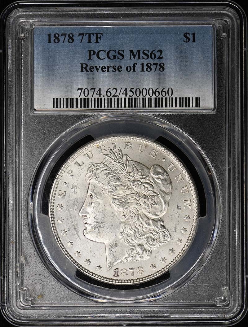 1878 7TF $1 7TF, Reverse of 1878 Morgan Dollar PCGS MS62: 1878 7TF $1 7TF, Reverse of 1878 Morgan Dollar PCGS MS62 MS62 1878 7TF Reverse of 1878 Morgan Dollar, certified by PCGS, showcases a high grade of preservation with a circulated background and sharp d