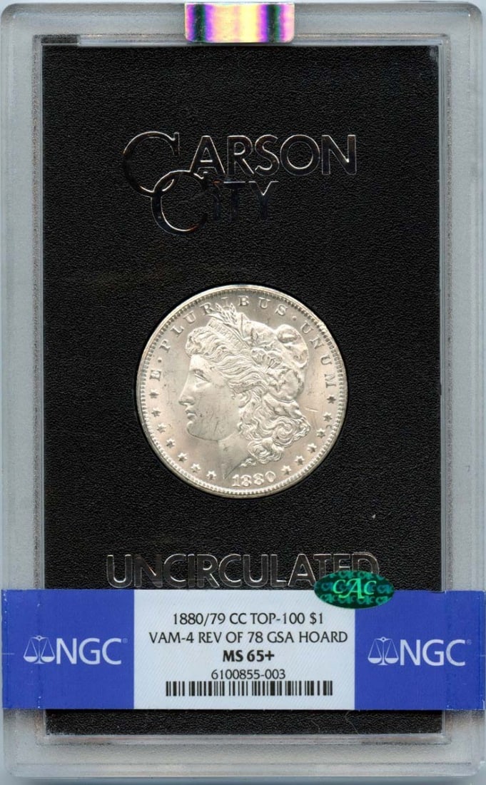 1880/ 79-CC Morgan Dollar VAM-4 Rev 78 GSA HOARD S$1 NGC MS65+ Plus (CAC): 1880/ 79-CC Morgan Dollar VAM-4 Rev 78 GSA HOARD S$1 NGC MS65+ Plus (CAC) The 1880/79-CC Morgan Dollar VAM-4 Rev 78, certified by the Numismatic Guaranty Corporation (NGC) as MS65+, boasts a striking 