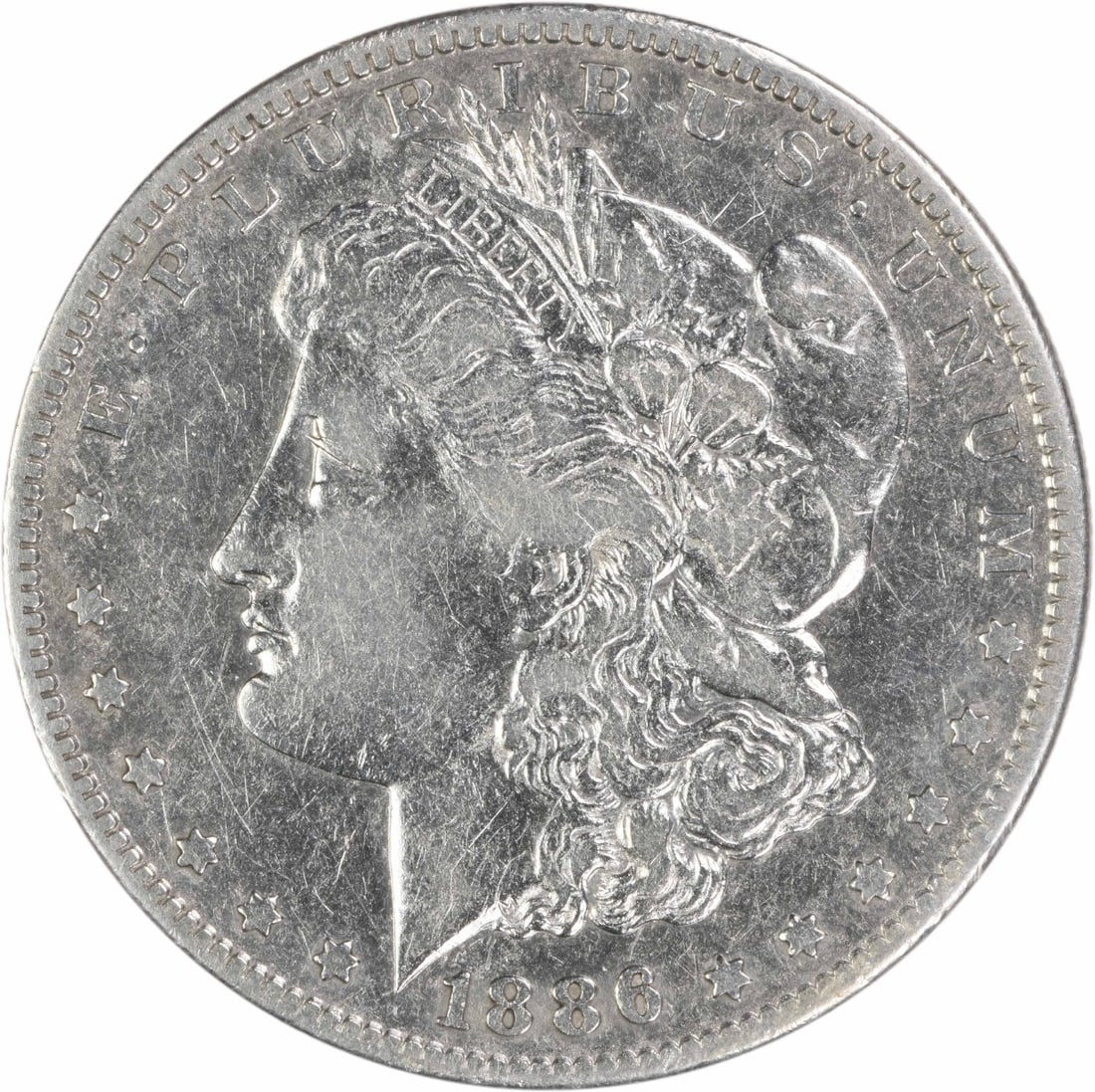 1886-S Morgan Silver Dollar VF Uncertified: 1886-S Morgan Silver Dollar VF Uncertified The 1886-S Morgan Silver Dollar is a circulated coin with a rich history, featuring a reeded edge and a distinctive mint mark. Made from 90% silver and 10% c