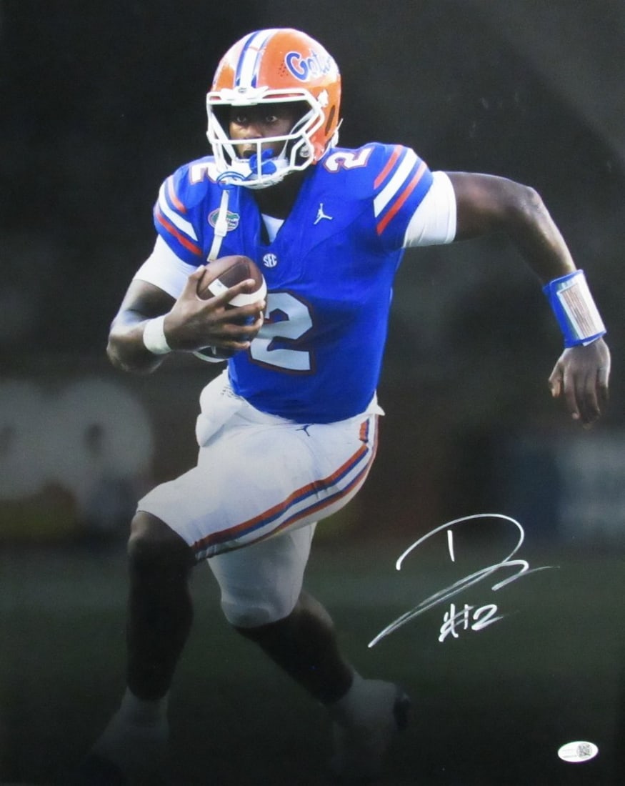 Signed Florida Gators Photo by D. J. Lagway JSA 196816: Signed Florida Gators Photo by D. J. Lagway JSA 196816 Signed by D. J. Lagway, a renowned artist, this Florida Gators photo showcases a unique moment in the team's history. The James Spence Authentica
