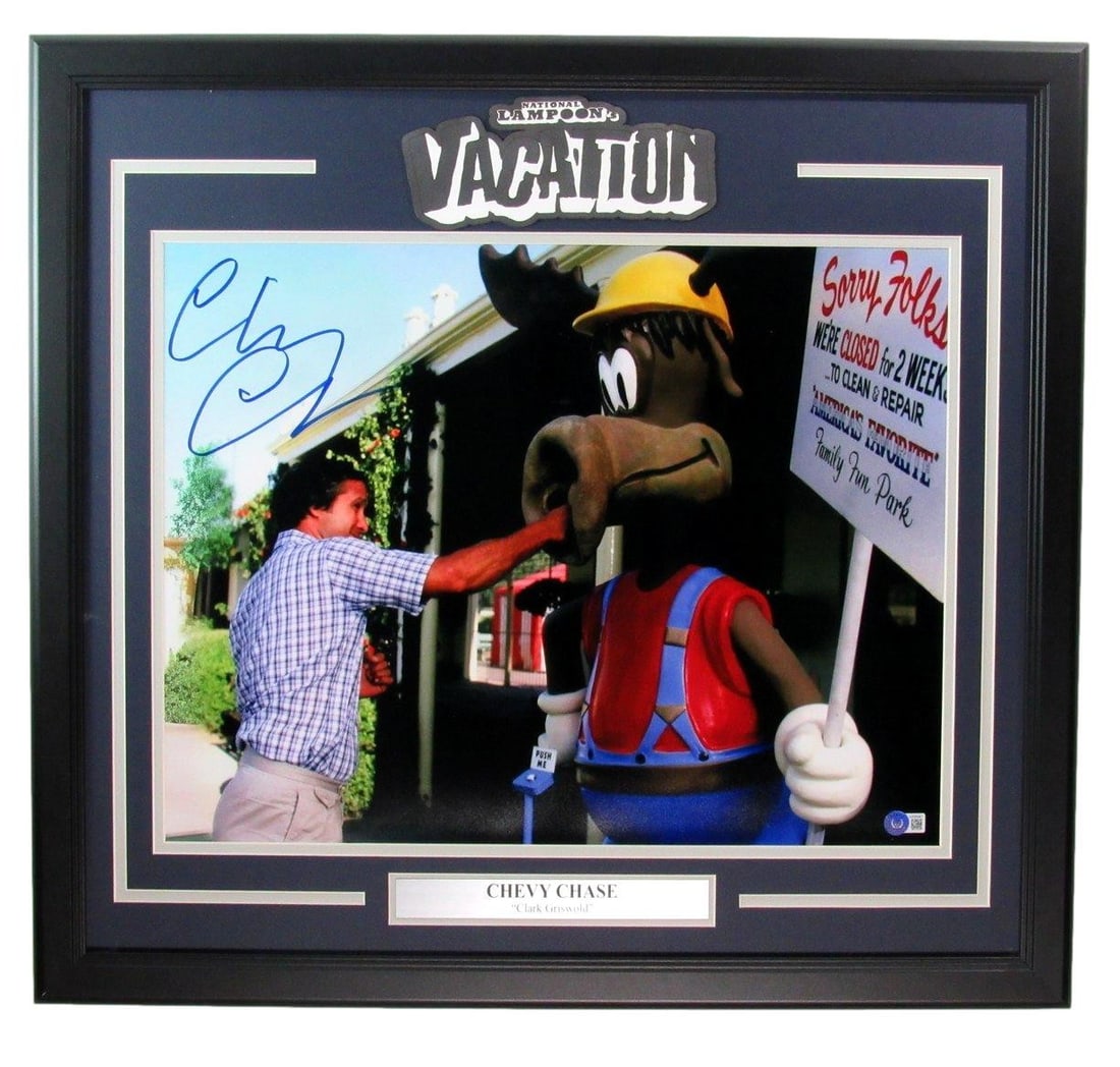 Signed Photo Framed Chase Chevy Auto 16x20 "Family Vacation: Signed Photo Framed Chase Chevy Auto 16x20 "Family Vacation Signed photo bears a signature, framed in a 16x20 inch photo original reproduction of a Chevy auto, depicting a "Family Vacation". The NCAA