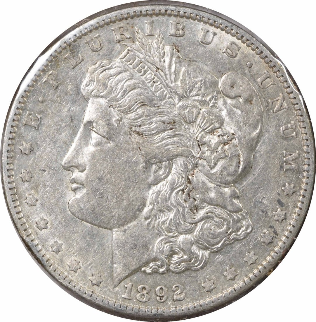 1892-O VAM 5 (7) Morgan Silver Dollar Doubled Ear AU Uncertified: 1892-O VAM 5 (7) Morgan Silver Dollar Doubled Ear AU Uncertified The 1892-O VAM 5 (7) Morgan Silver Dollar Doubled Ear is a circulated coin with a unique doubled ear design, a result of the coin being