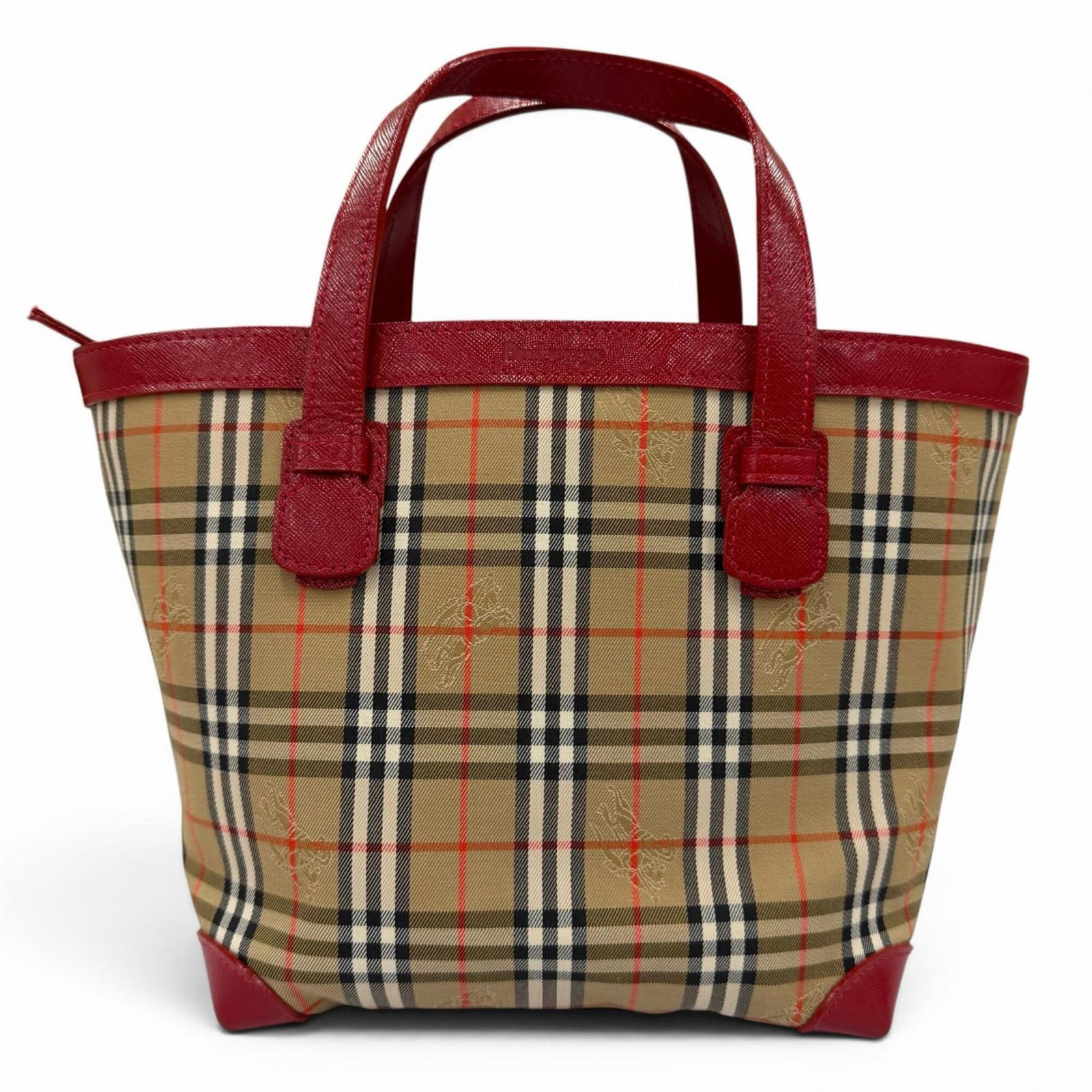BURBERRY Handbag Canvas Leather: BURBERRY Handbag Canvas Leather Canvas and leather combine in this iconic Burberry handbag, available in a rich brown and bold red color combination. Measuring 20cm x 28cm x 15cm, it features a timele