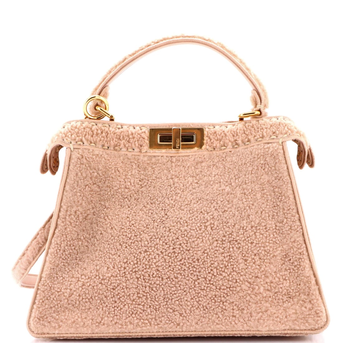 Shearling Medium Peekaboo ISeeU Fendi Bag: Shearling Medium Peekaboo ISeeU Fendi Bag Shearling Medium Peekaboo ISeeU Fendi Bag features a neutral exterior with a subtle shearing effect, adding a touch of sophistication to any outfit. The