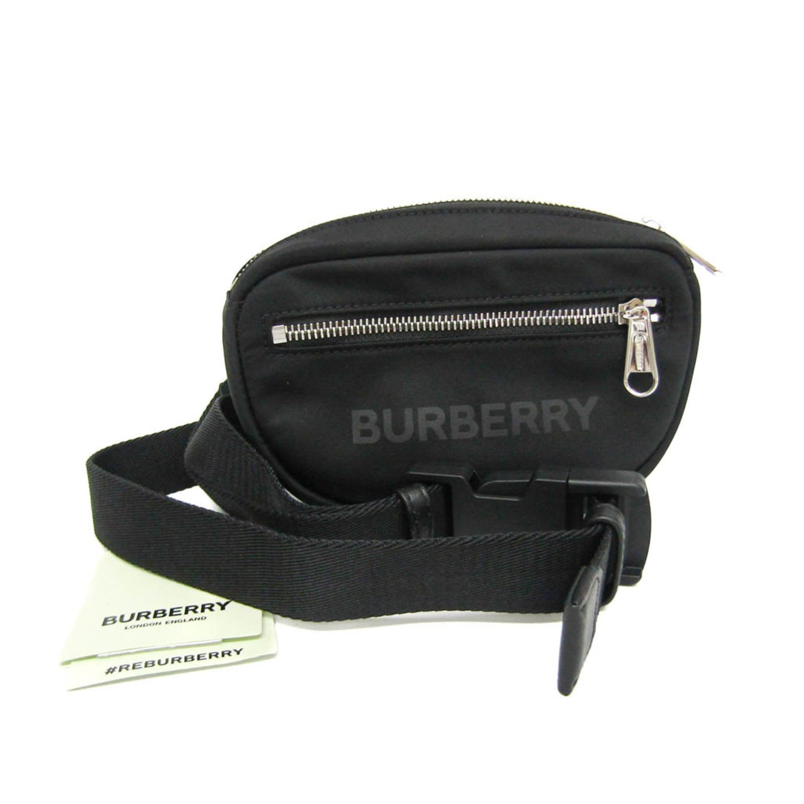 BURBERRY Fanny Pack Nylon: BURBERRY Fanny Pack Nylon Black Burberry Fanny Pack made from durable nylon, measuring 13cm x 17.5cm x 4cm, weighing 260g. In like new condition with no visible wear, this fanny pack looks and functio