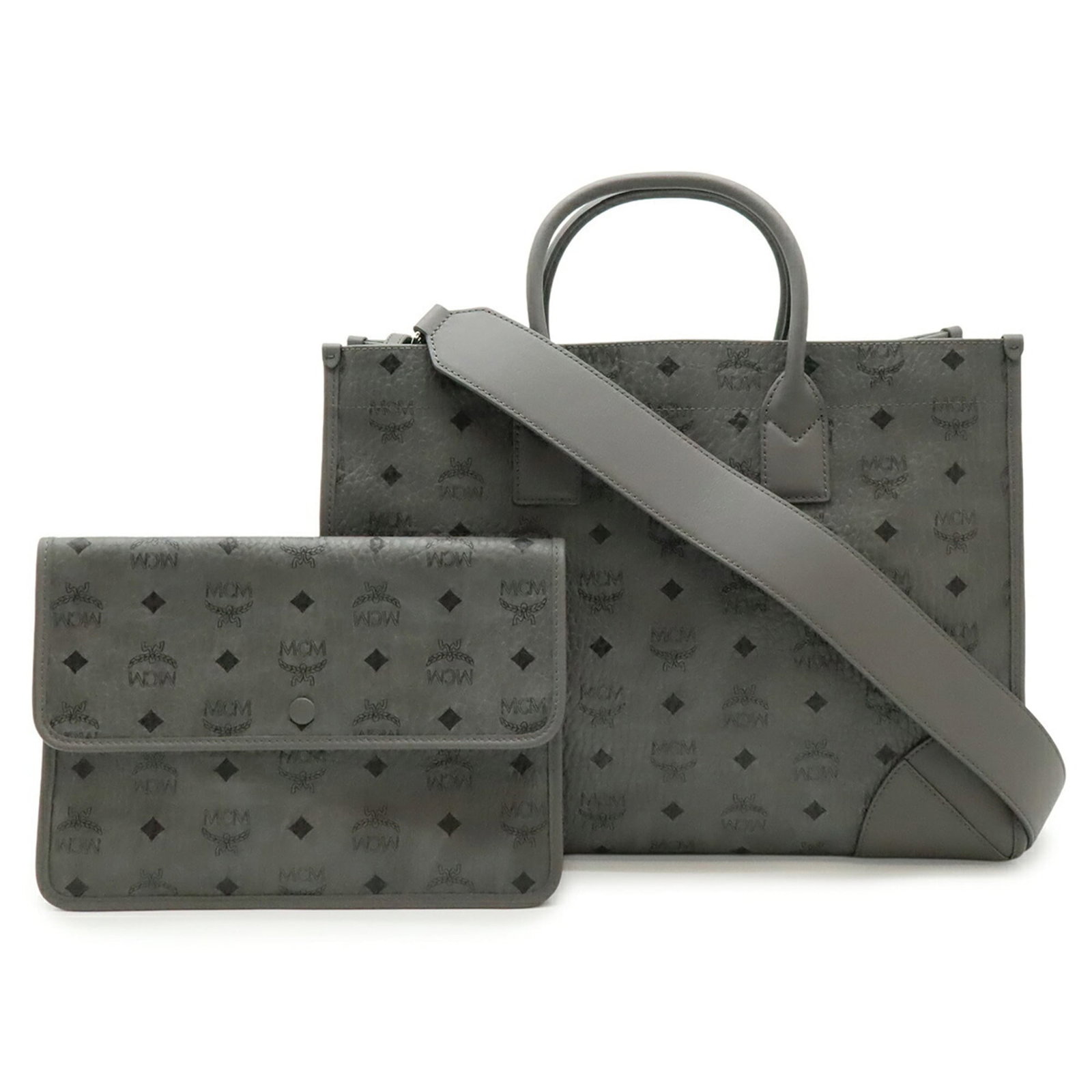 MCM Handbag Shoulder Bag Pvc Leather: MCM Handbag Shoulder Bag Pvc Leather MCM Country of Origin: South Korea. This black PVC leather shoulder bag features a sleek design with a subtle contrast between the PVC and leather materials. With