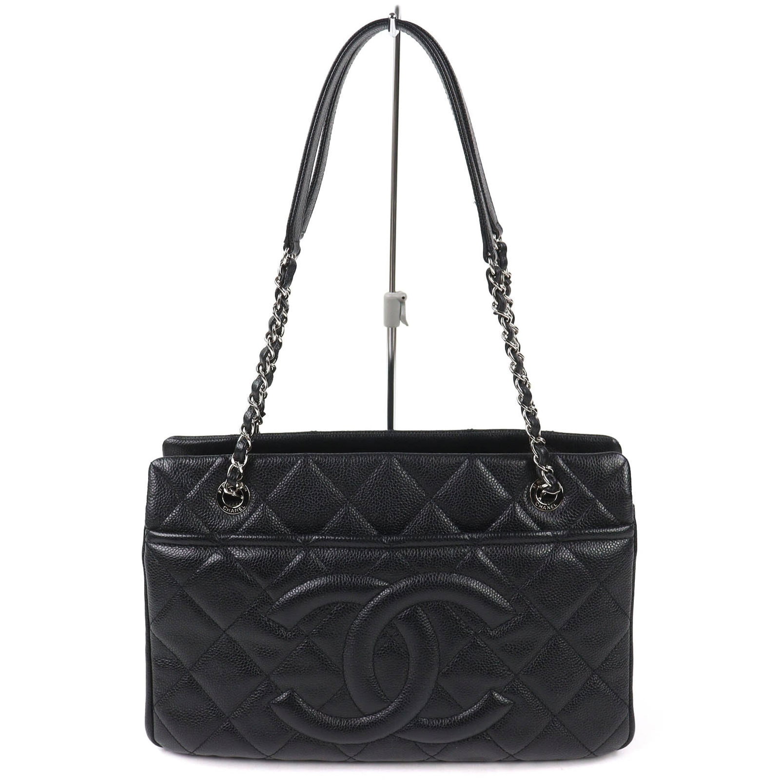 CHANEL Tote Bag Grained Calfskin: CHANEL Tote Bag Grained Calfskin Grained Calfskin Chanel Tote Bag in Black. This elegant tote bag features a timeless design with a classic black color and silver hardware, crafted from high-quality