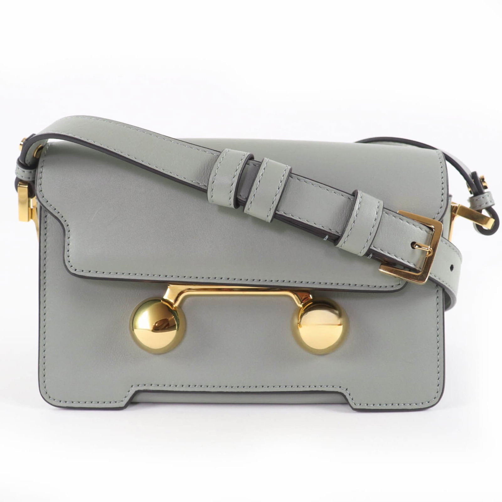 MARNI Shoulder Bag Leather: MARNI Shoulder Bag Leather Marni's iconic shoulder bag is a statement piece, boasting a sleek green leather exterior and gold hardware that adds a touch of sophistication. With its compact size and re